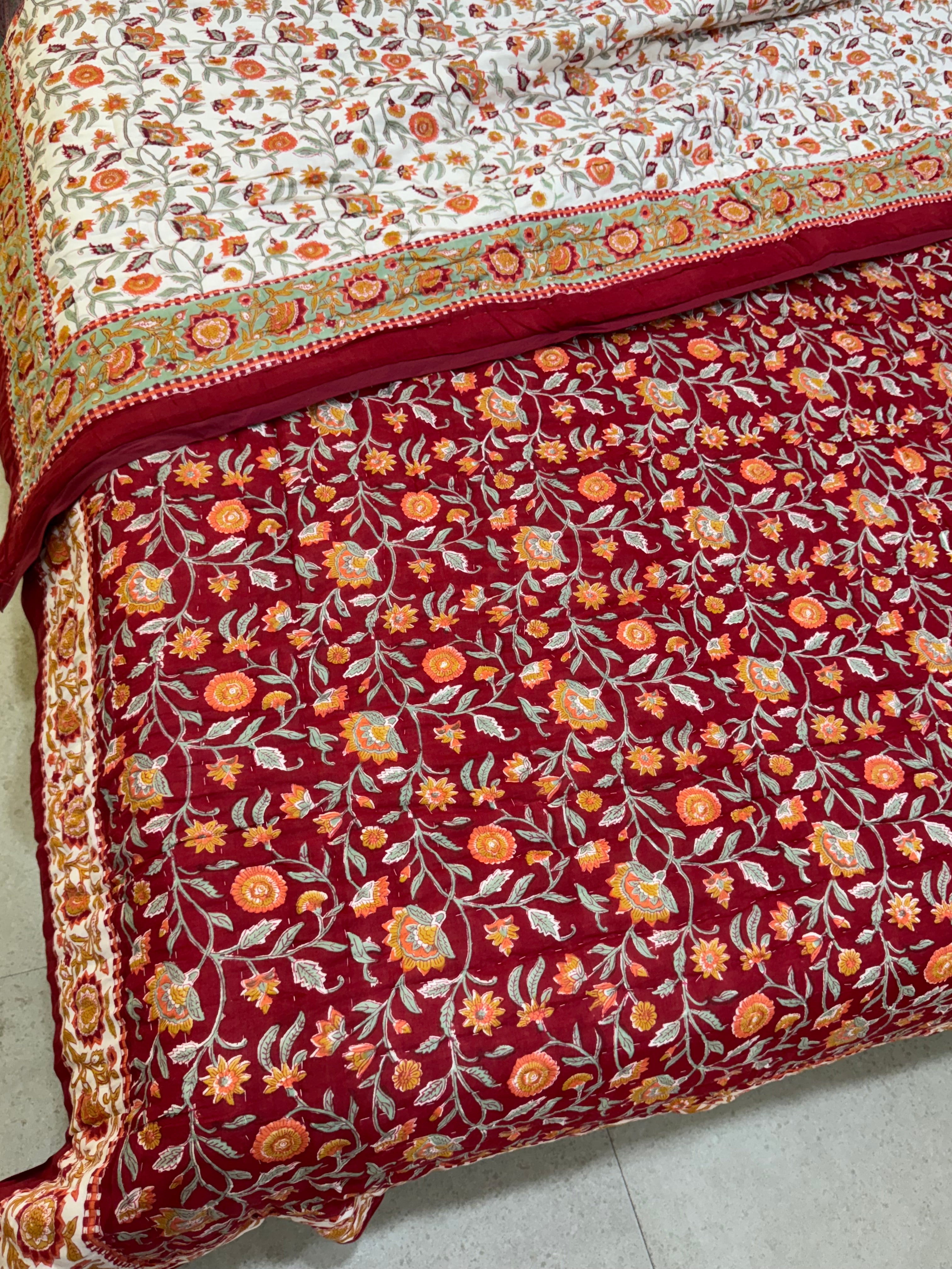 FESTIVE HAND BLOCK PRINTED REVERSIBLE QUILT (DOUBLE BED)