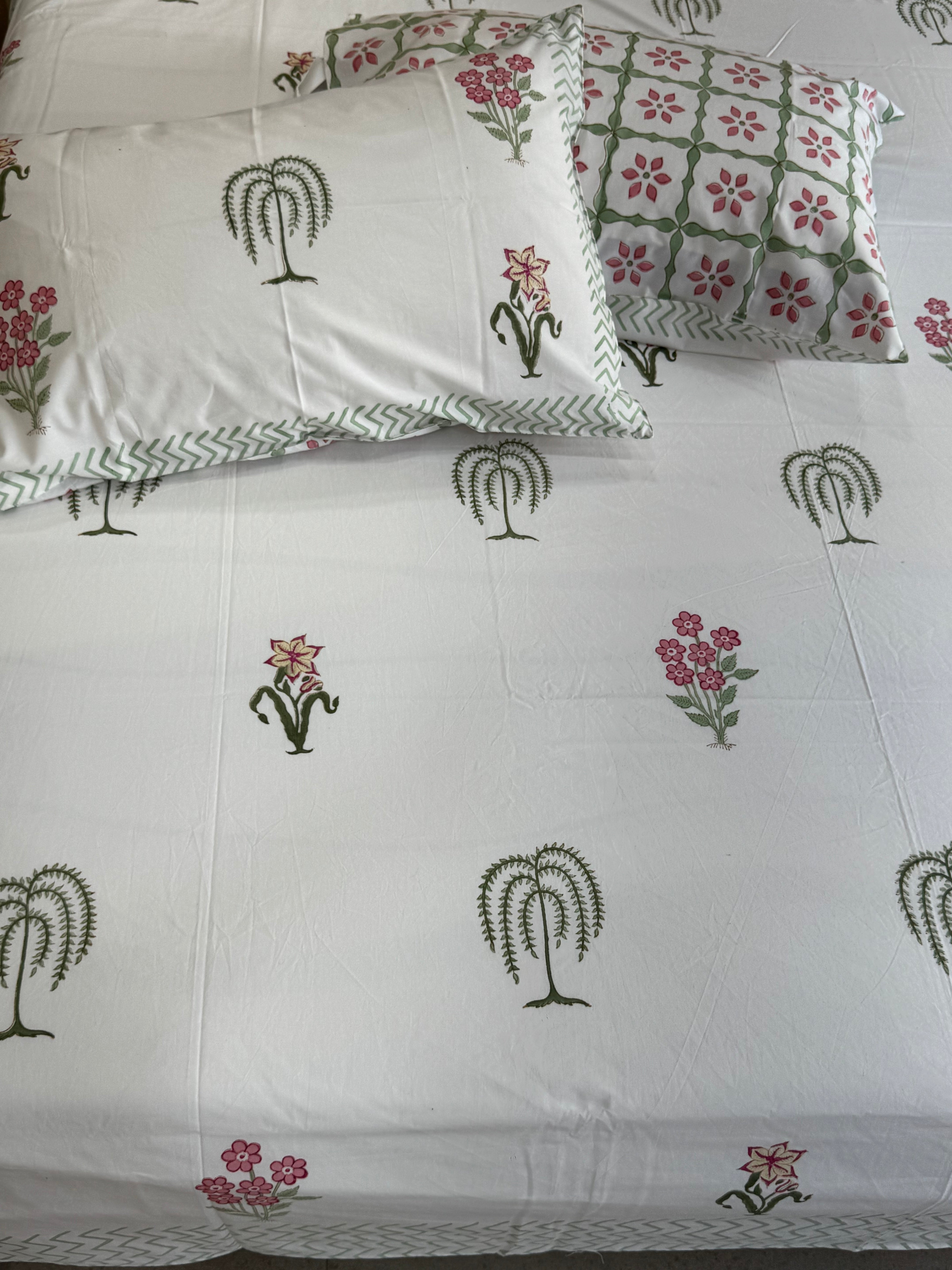 BLUSH BLOOM HAND BLOCK PRINTED BEDSHEET WITH TWO REVERSIBLE PILLOW COVERS
