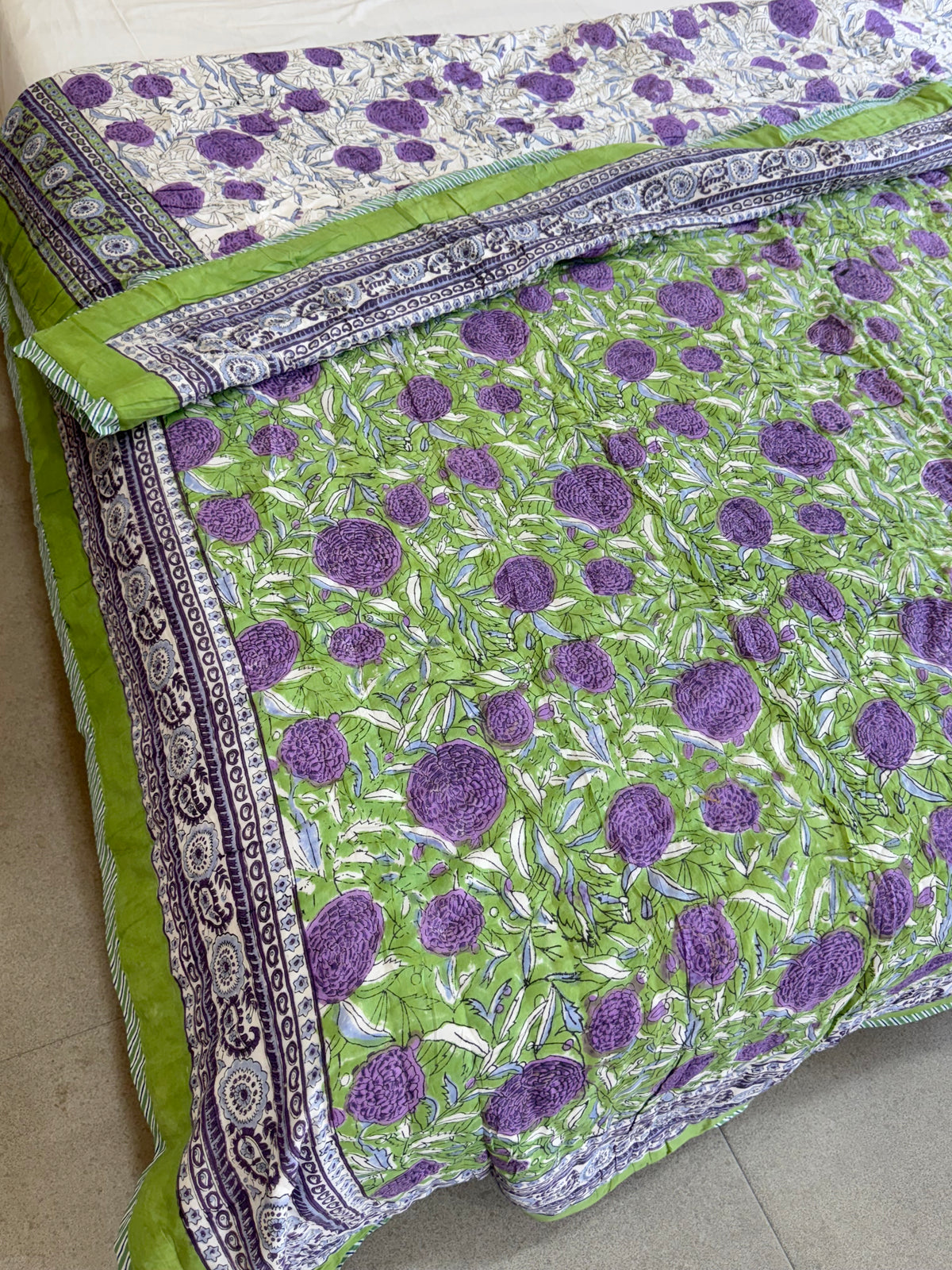 FESTIVE HAND BLOCK PRINTED REVERSIBLE QUILT (DOUBLE BED)