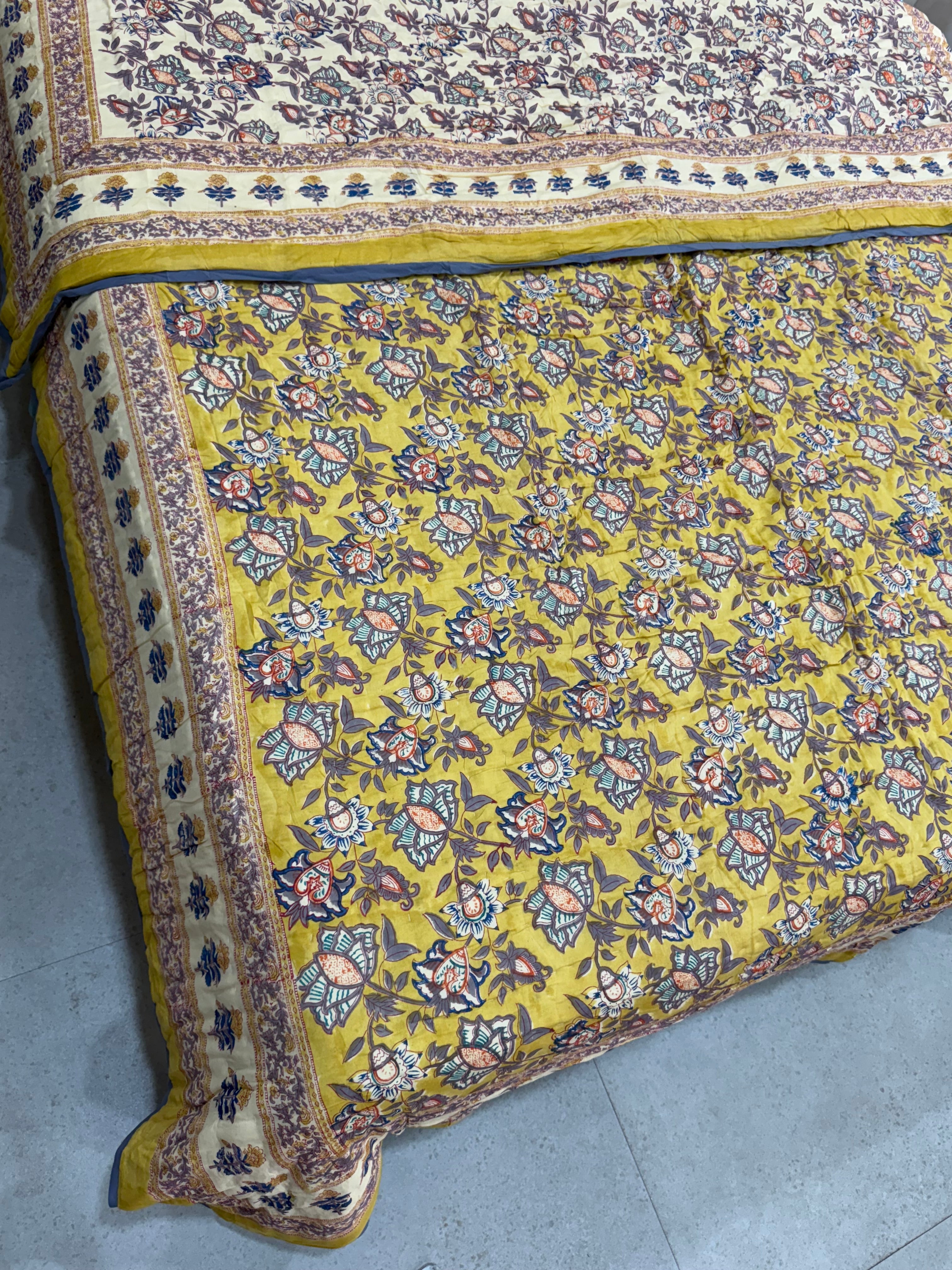 FESTIVE HAND BLOCK PRINTED REVERSIBLE QUILT (DOUBLE BED)