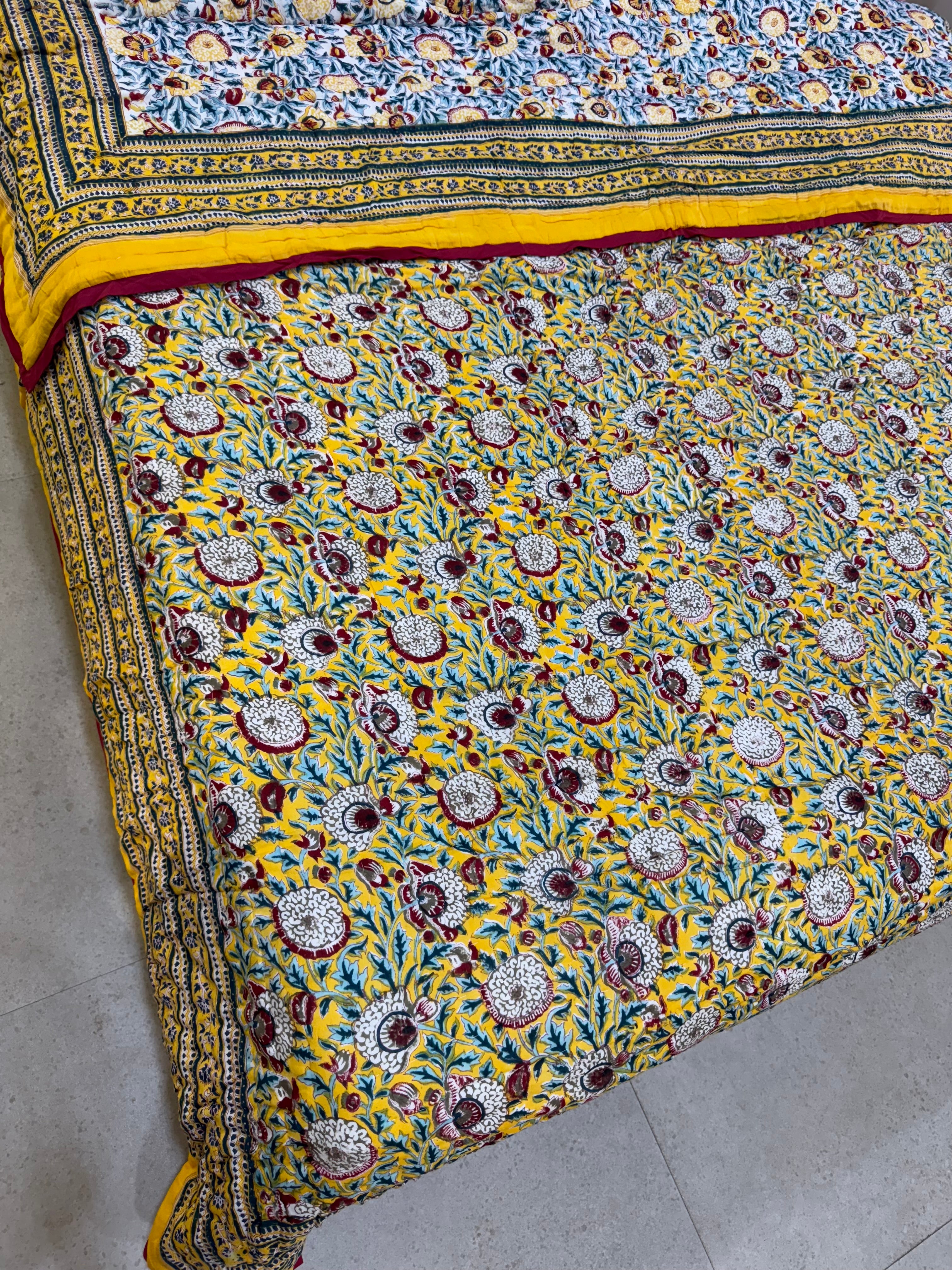 FESTIVE HAND BLOCK PRINTED REVERSIBLE QUILT (DOUBLE BED)