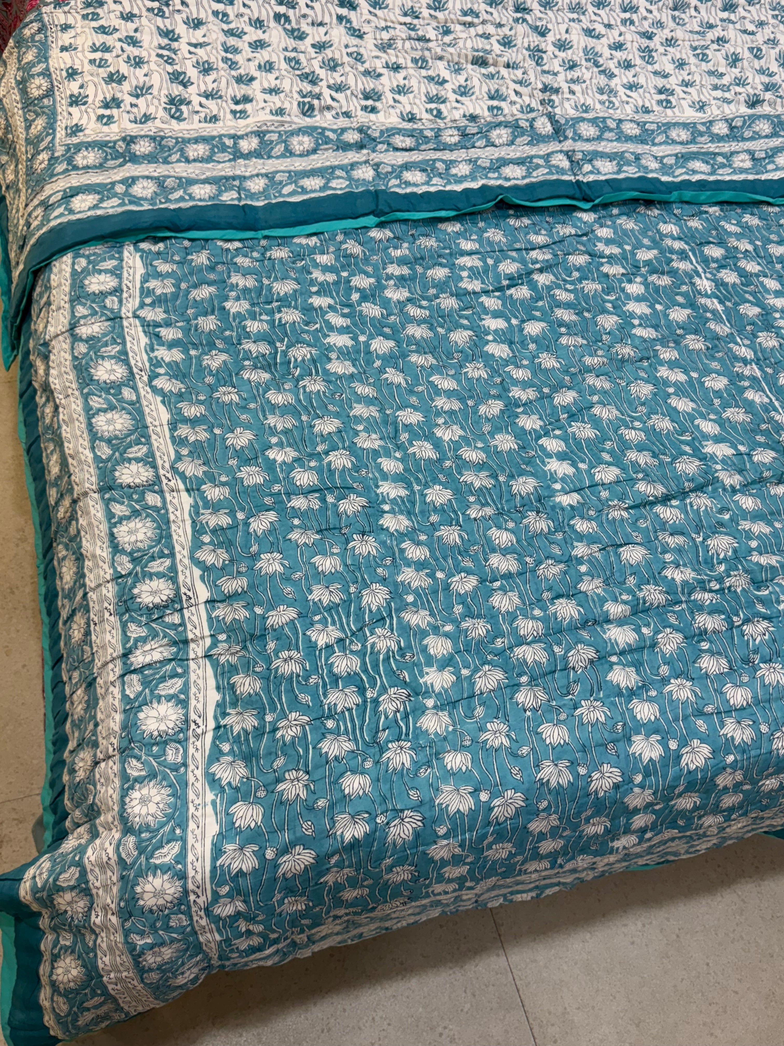 FESTIVE HAND BLOCK PRINTED REVERSIBLE QUILT (DOUBLE BED)