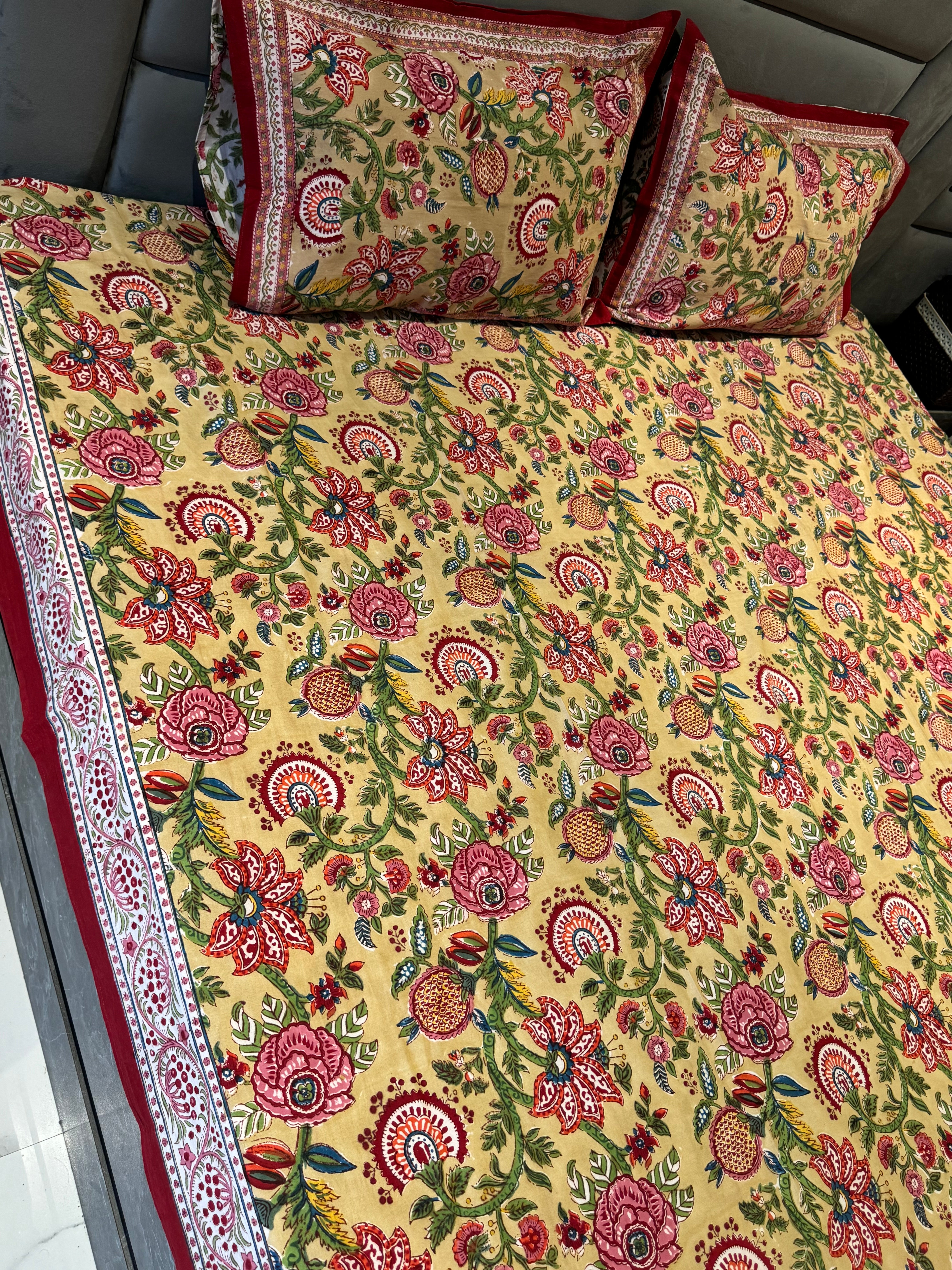 FESTIVE HAND BLOCK PRINTED BEDSHEET WITH TWO REVERSIBLE PILLOW COVERS