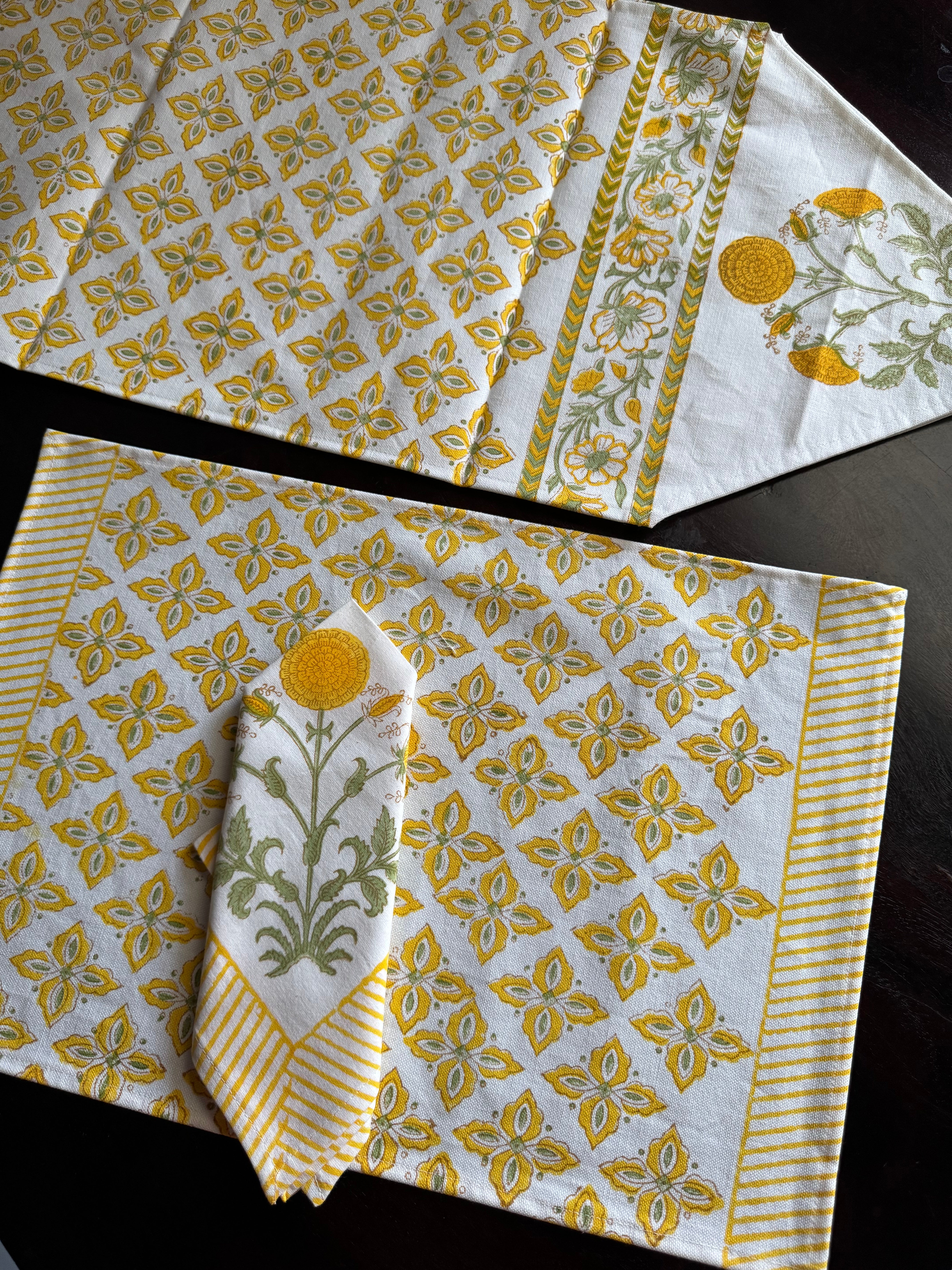 A PAIR OF HANDBLOCK PRINTED TABLE MAT AND NAPKIN SET