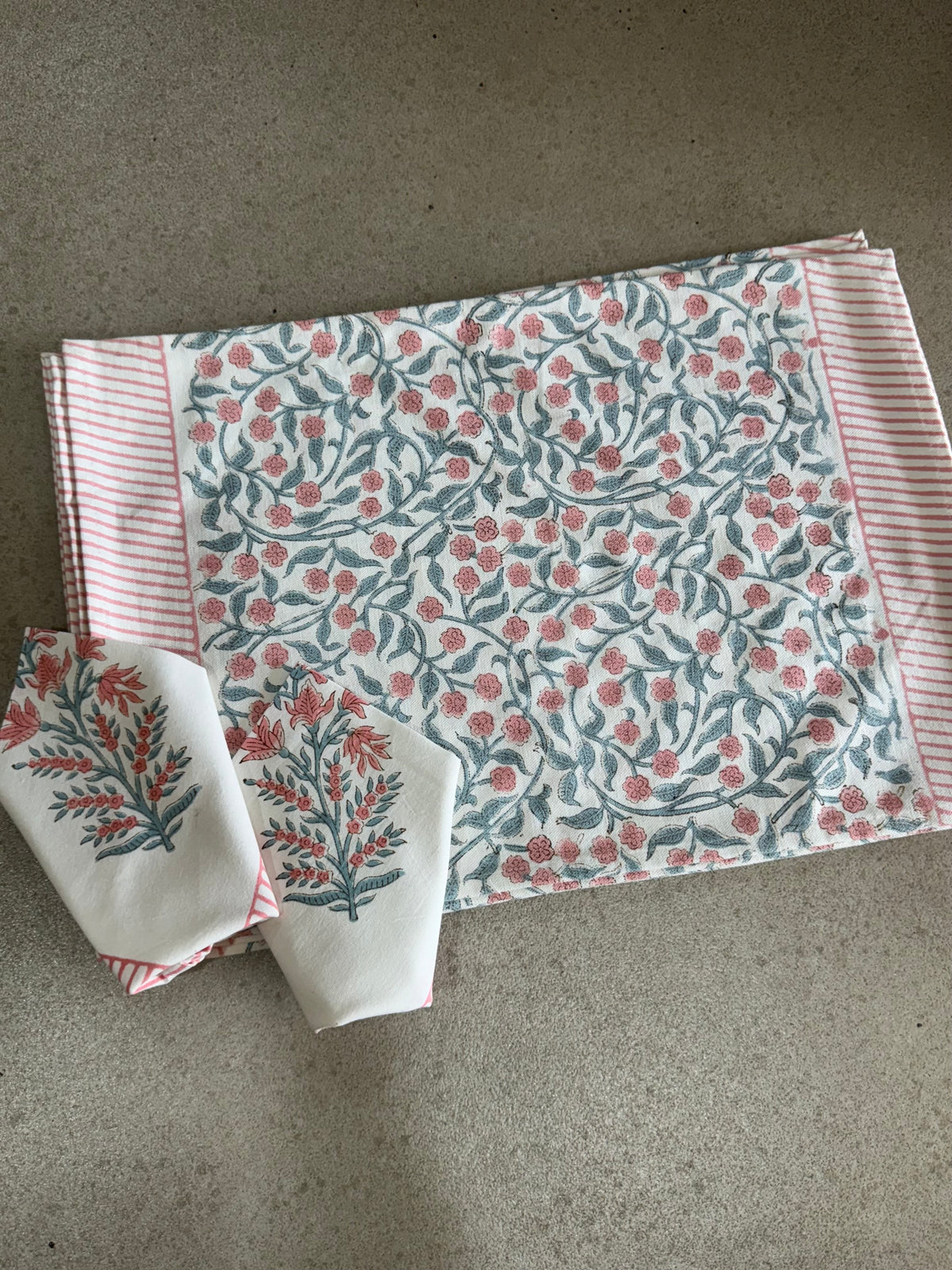 A PAIR OF HANDBLOCK PRINTED TABLE MAT AND NAPKIN SET