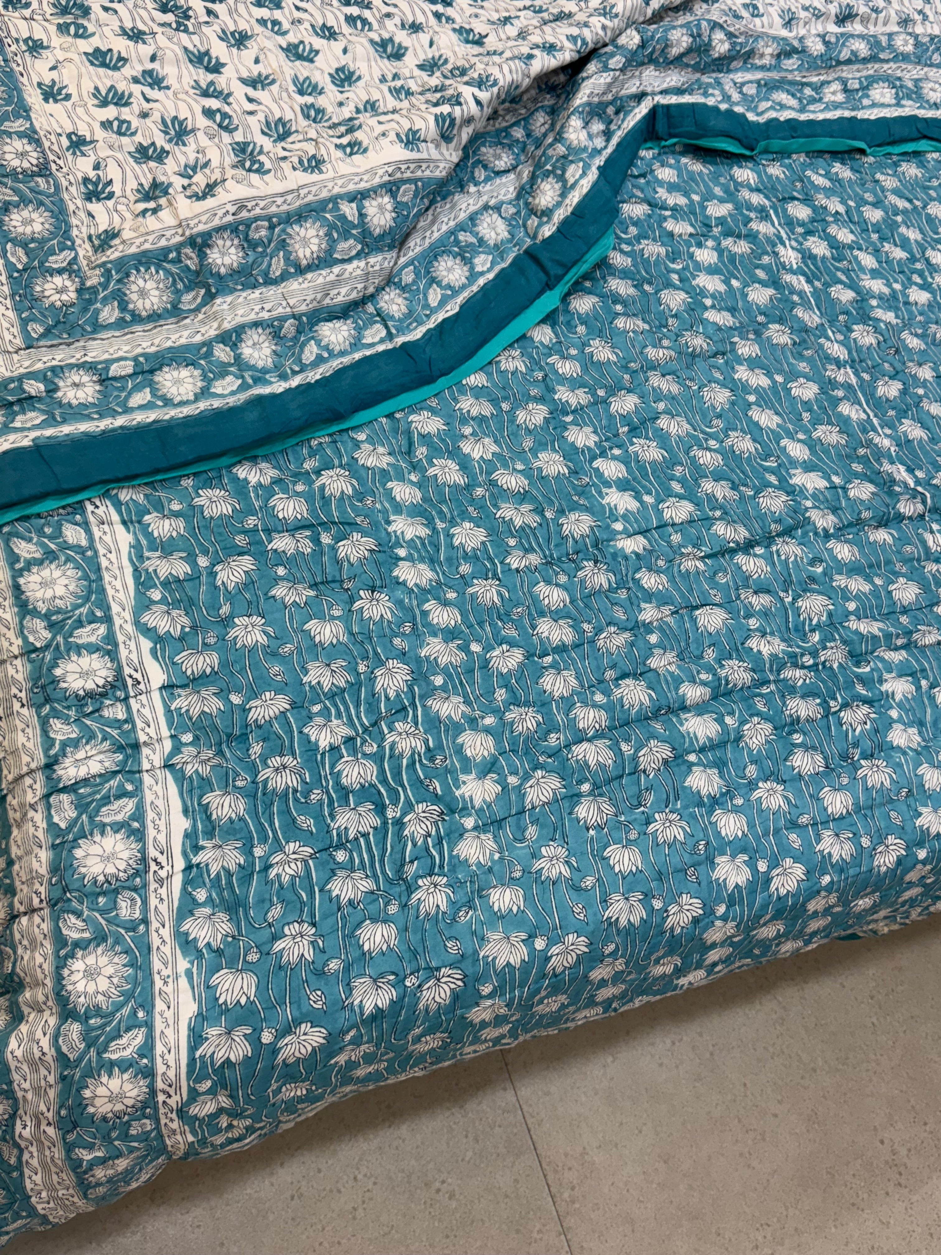 FESTIVE HAND BLOCK PRINTED REVERSIBLE QUILT (DOUBLE BED)