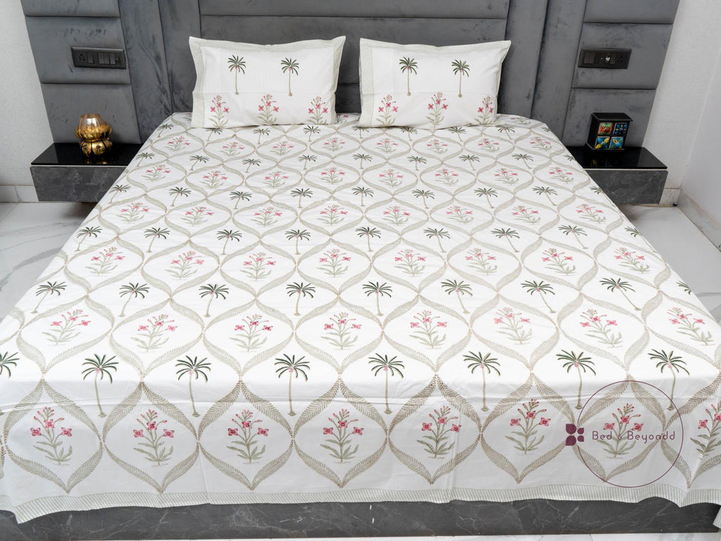 BLUSHING  PALM HAND BLOCK PRINTED BEDSHEET WITH TWO REVERSIBLE PILLOW COVERS