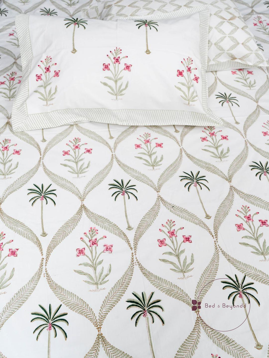 BLUSHING  PALM HAND BLOCK PRINTED BEDSHEET WITH TWO REVERSIBLE PILLOW COVERS