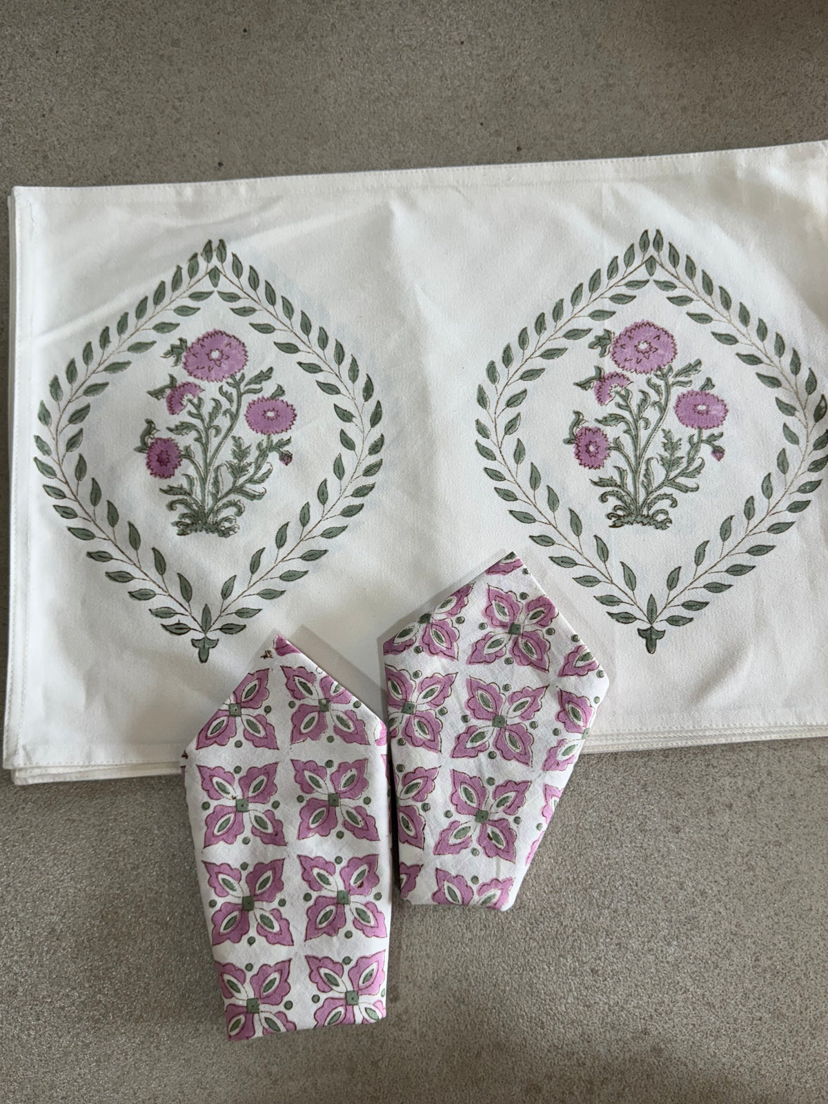 A PAIR OF HANDBLOCK PRINTED TABLE MAT AND NAPKIN SET