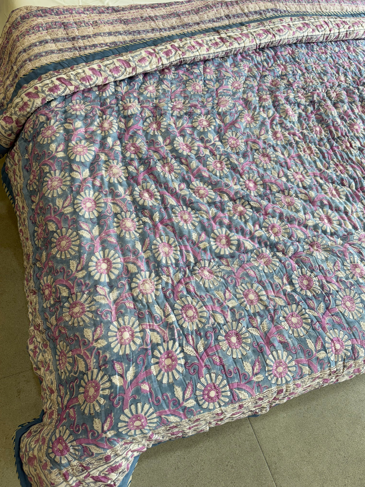 FESTIVE HAND BLOCK PRINTED REVERSIBLE QUILT (DOUBLE BED)