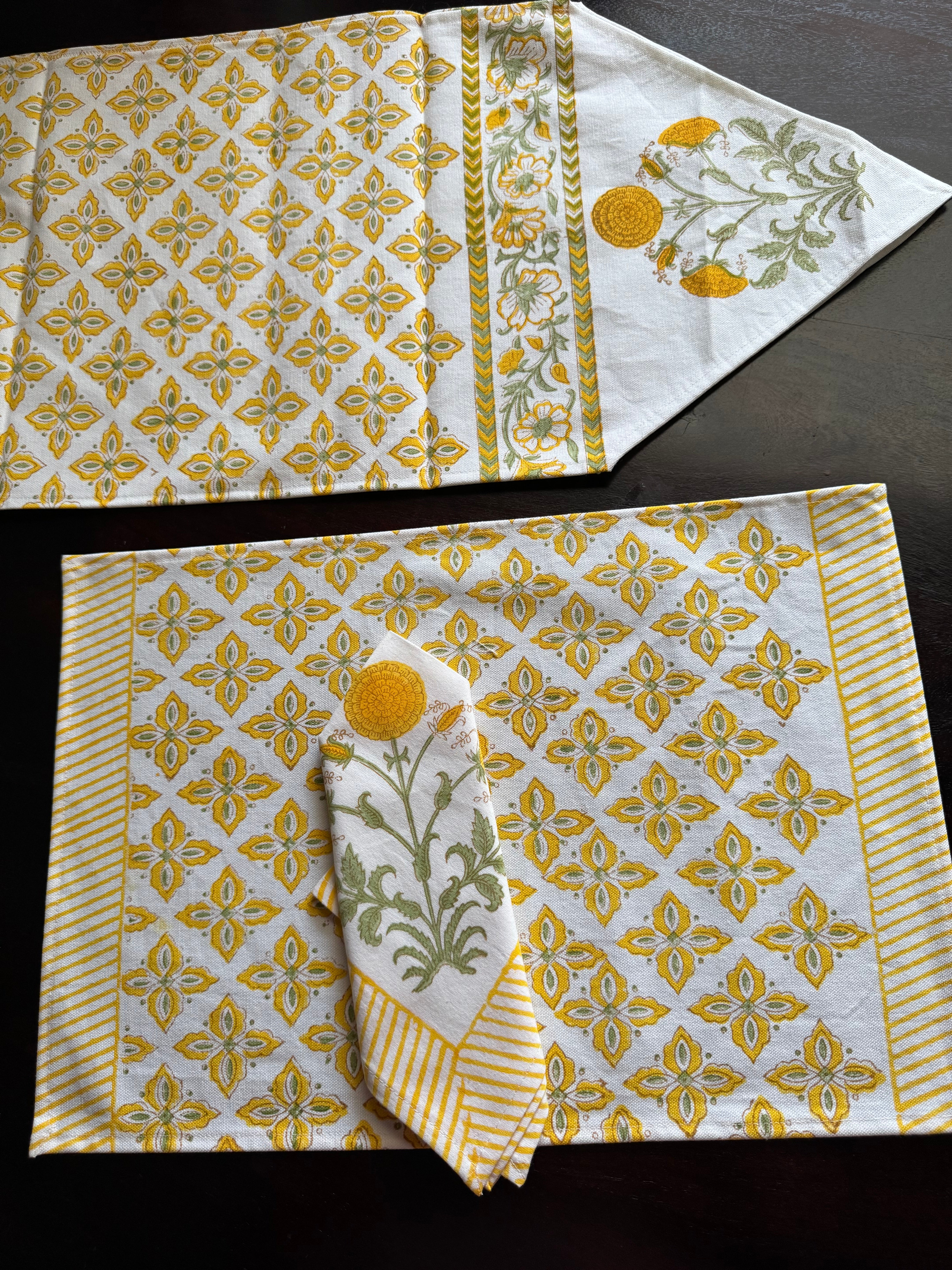 A PAIR OF HANDBLOCK PRINTED TABLE MAT AND NAPKIN SET