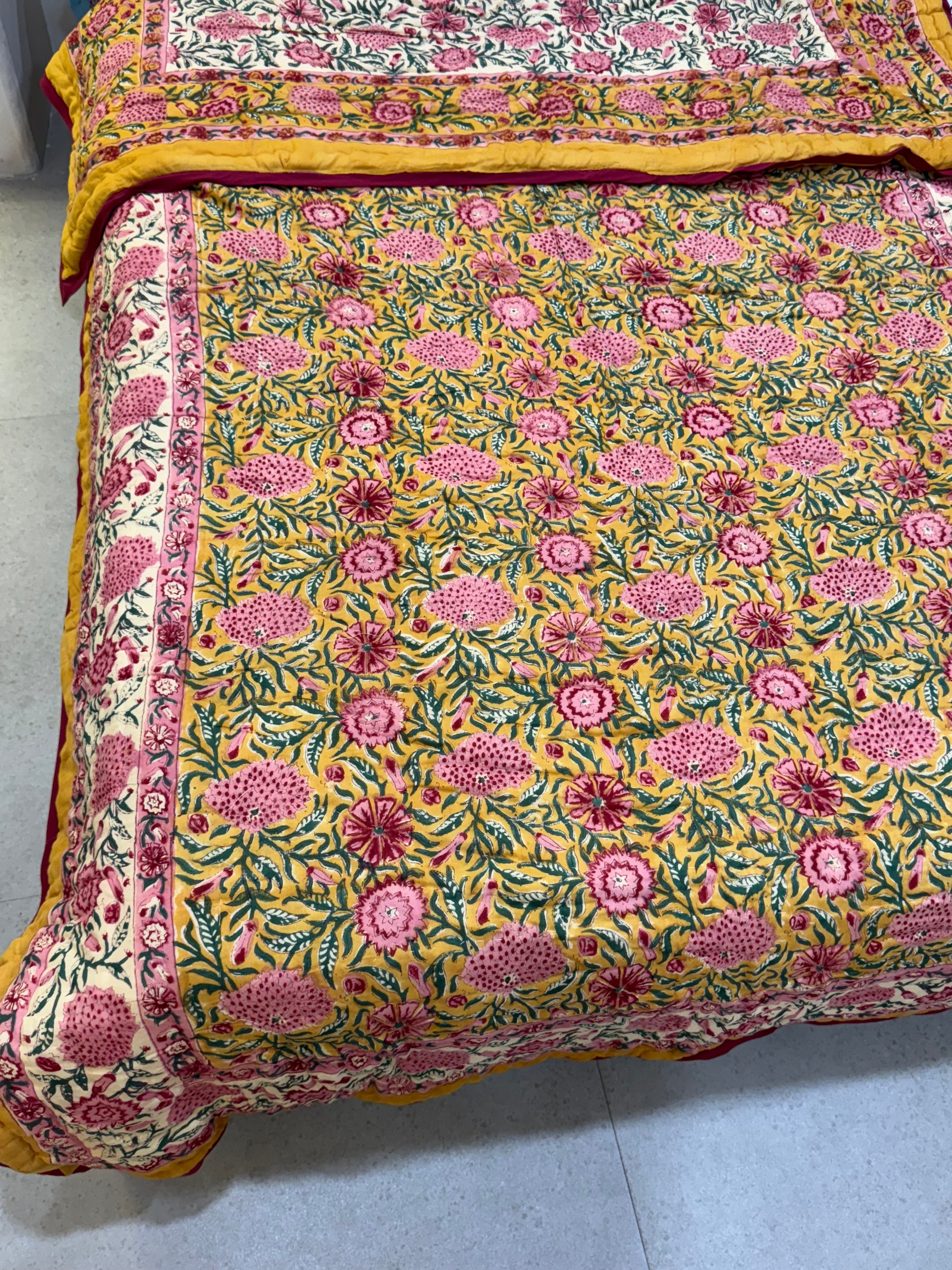 FESTIVE HAND BLOCK PRINTED REVERSIBLE QUILT (SINGLE BED)