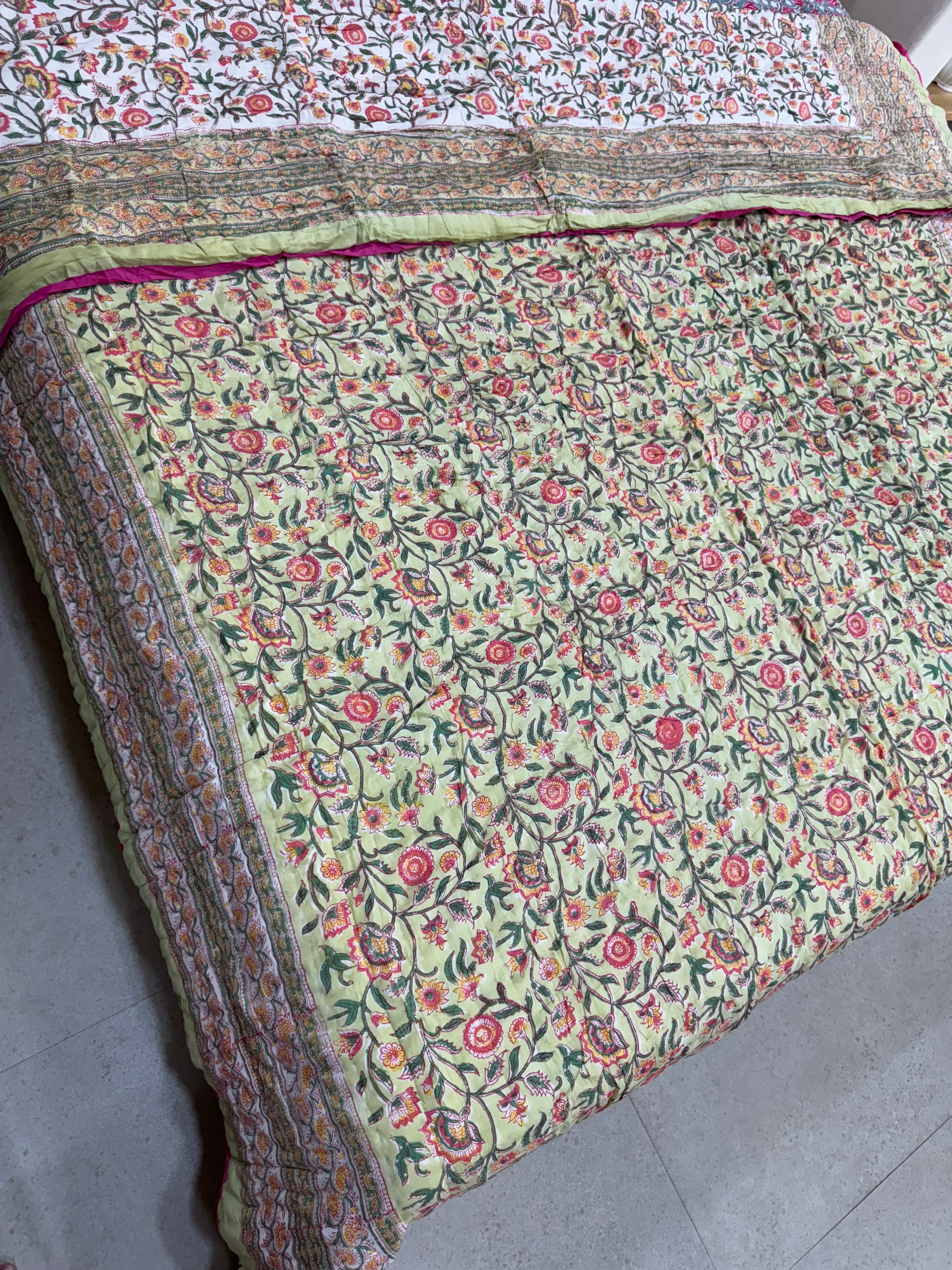 FESTIVE HAND BLOCK PRINTED REVERSIBLE QUILT (DOUBLE BED)