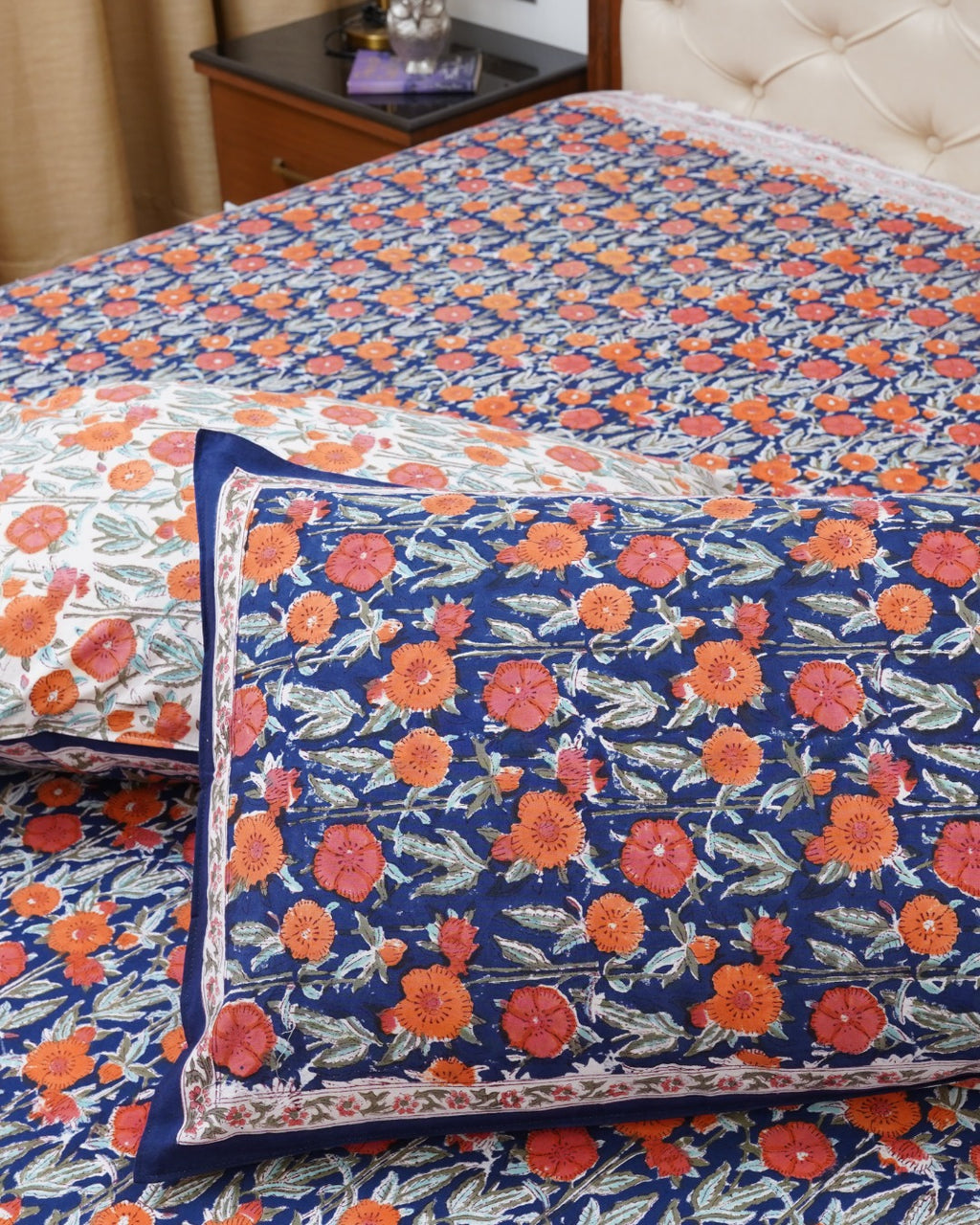 FESTIVE HANDBLOCK PRINTED BEDSHEET WITH 2 REVERSIBLE PILLOW COVERS