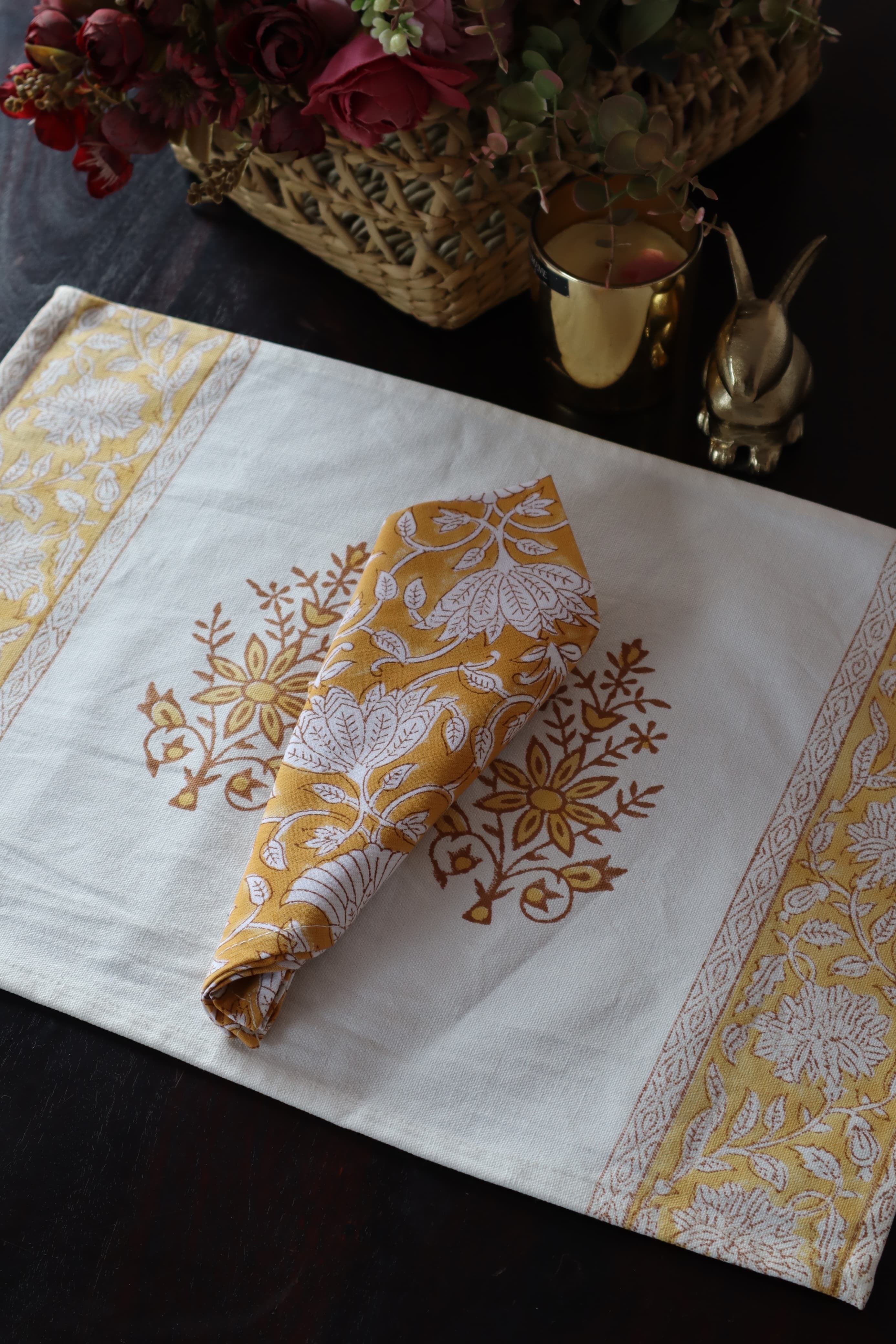 A PAIR OF HANDBLOCK PRINTED TABLE MAT AND NAPKIN SET