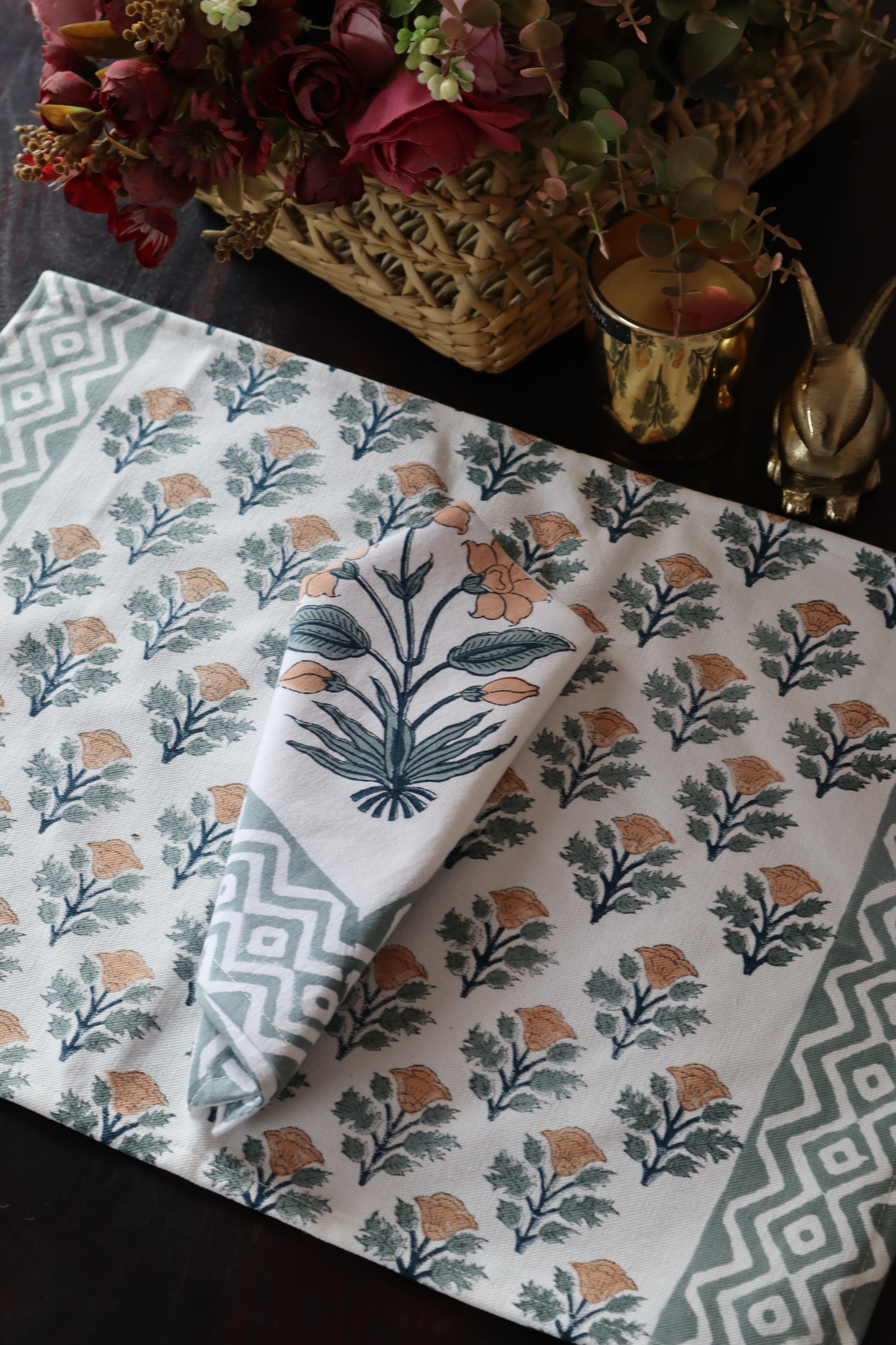 A PAIR OF HANDBLOCK PRINTED TABLE MAT AND NAPKIN SET