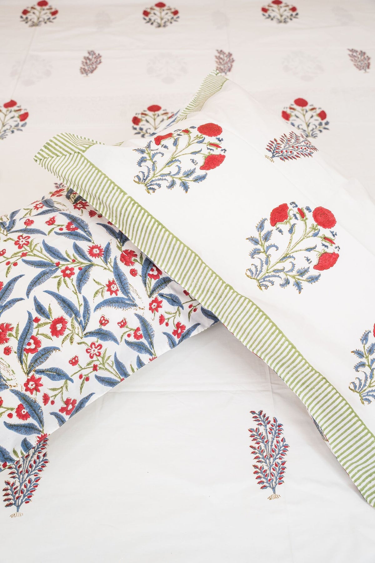 PETALS & POETRY HAND BLOCK PRINTED BEDSHEET WITH TWO REVERSIBLE PILLOW COVERS