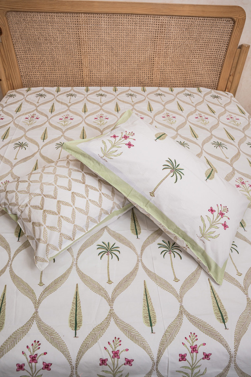 BLUSHING PALM HANDBLOCK PRINTED BEDSHEET WITH TWO REVERSIBLE PILLOW COVERS