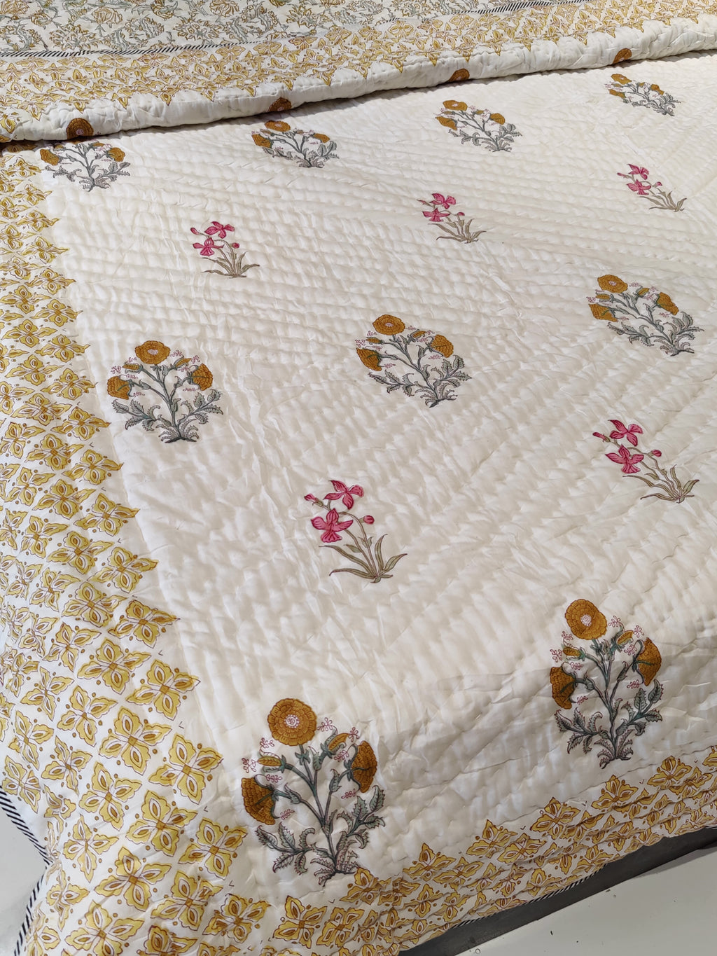 MARIGOLD LILY HAND BLOCK PRINTED REVERSIBLE MULMUL QUILT