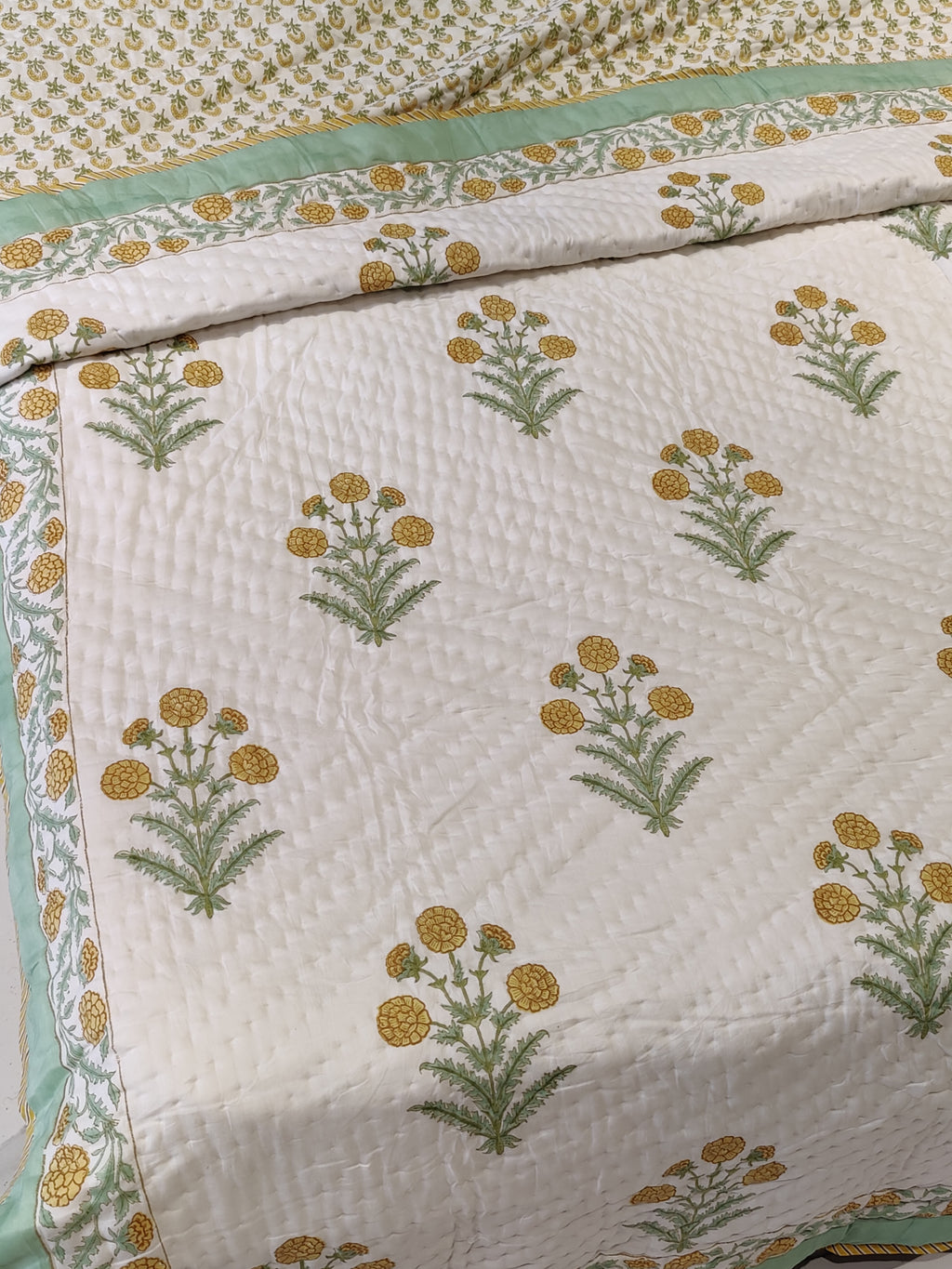 MARIGOLD WITH GREEN BORDER HAND BLOCK PRINTED REVERSIBLE MULMUL QUILT