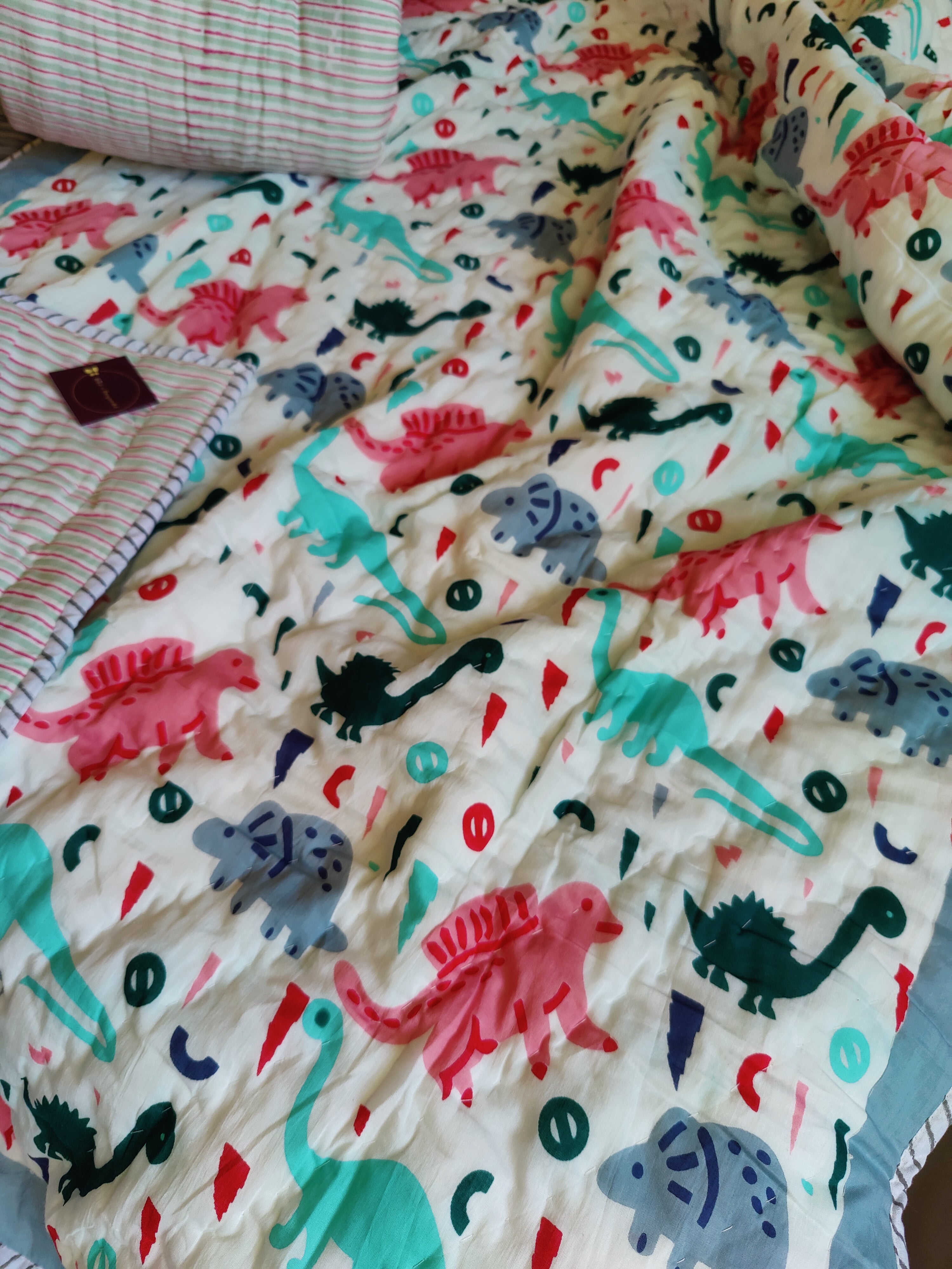 DINO HANDBLOCK PRINTED REVERSIBLE MULMUL BABY QUILT